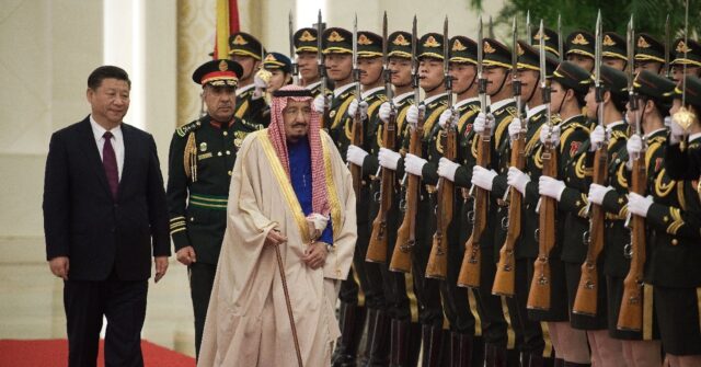 file photo saudi king salman reviews an honour guard chinese president xi jinping ceremony